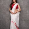 Cheerful Ivory White Mul Cotton saree with Scarlet Red tassels | By Nikunj Khatri 2025