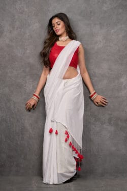 Cheerful Ivory White Mul Cotton saree with Scarlet Red tassels | By Nikunj Khatri 2025