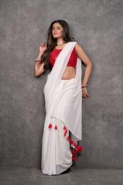 Cheerful Ivory White Mul Cotton saree with Scarlet Red tassels | By Nikunj Khatri 2025