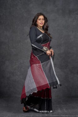 Pallu close-up of Playful Cotton Linen Saree featuring Black, Maroon, and Grey Checked Design
