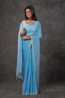 Lifestyle image of model wearing Pastel Sky Blue Mul Cotton Saree premium handwoven cotton by Nikunj Khatri 2025
