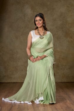 Lifestyle photo of model wearing Savvy Mint Green Mul Cotton Saree – breathable, premium cotton by Nikunj Khatri 2025